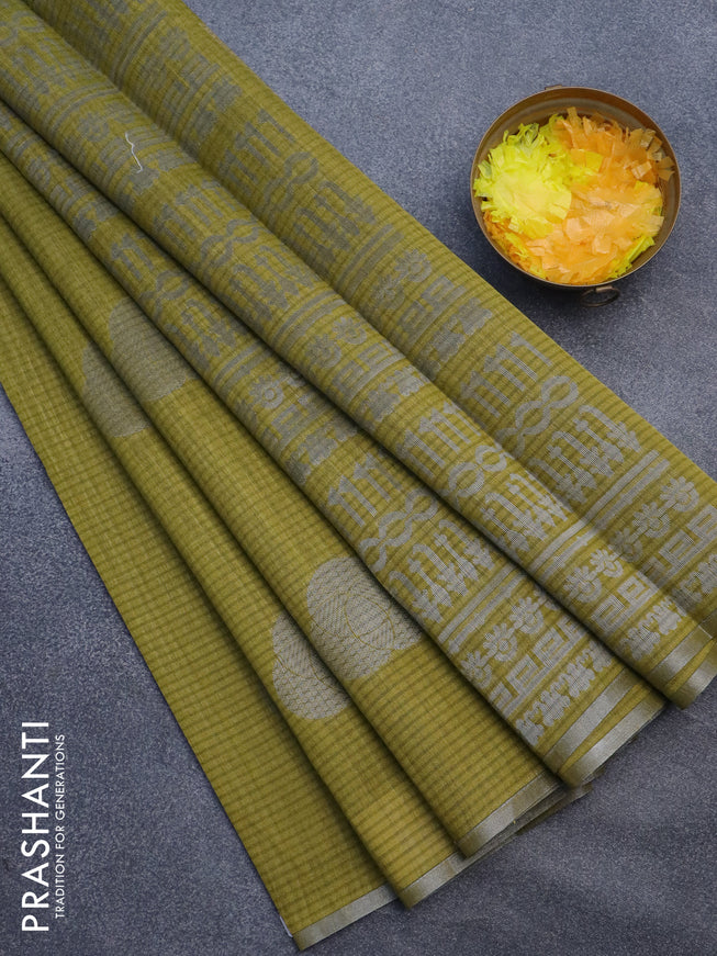 Matka tussar saree mehendi green with allover zari woven geometric buttas and piping border