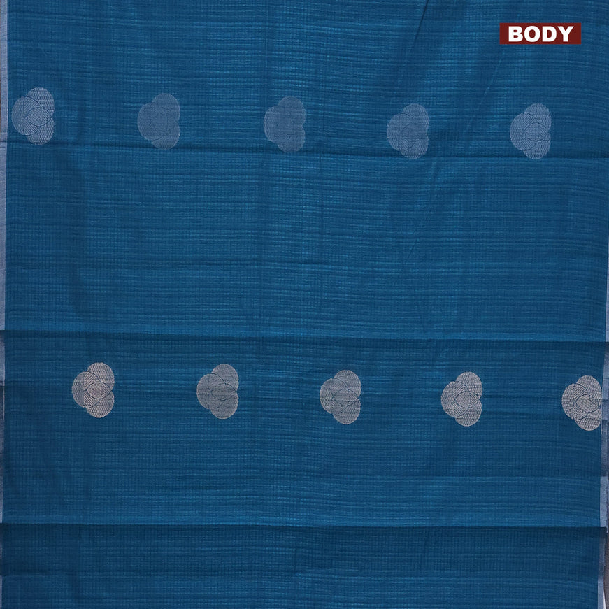 Matka tussar saree cs blue with allover zari woven geometric buttas and piping border