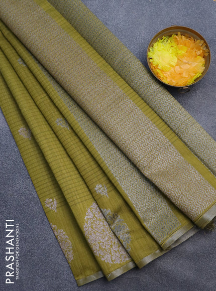 Matka tussar saree mehendi green with thread & zari woven floral buttas and piping border