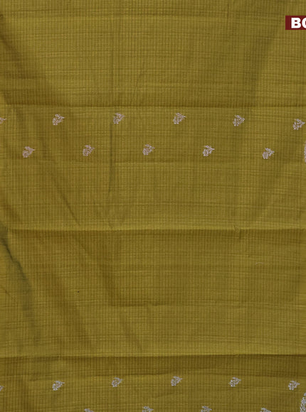 Matka tussar saree mehendi green with thread & zari woven floral buttas and piping border