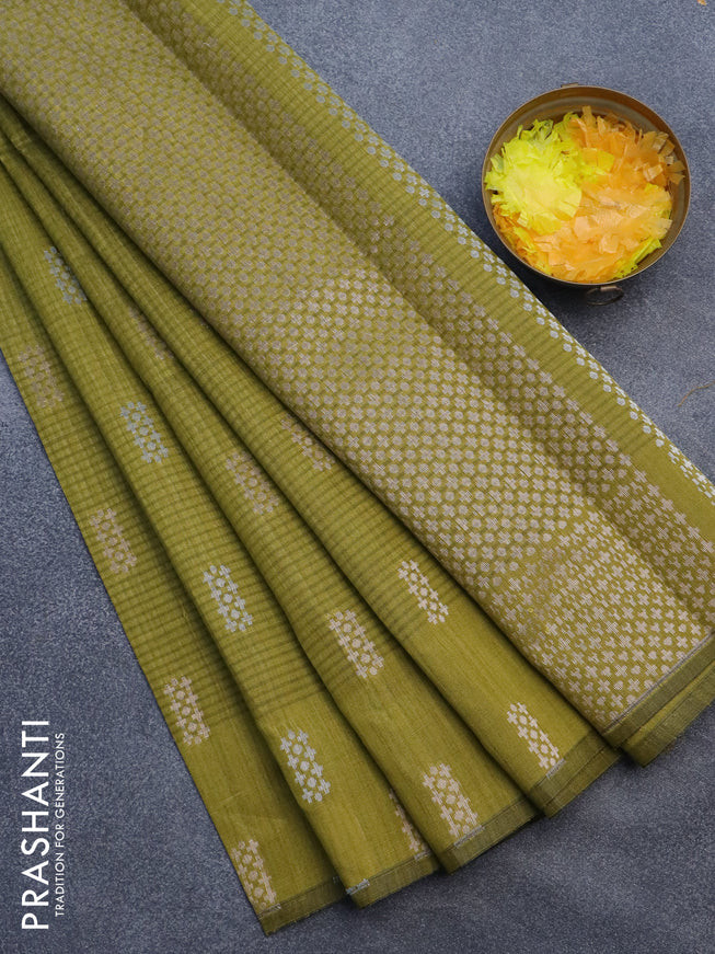 Matka tussar saree mehendi green with zari woven buttas and piping border