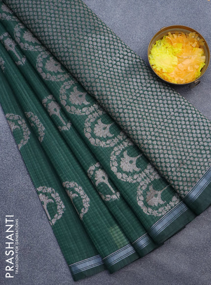 Matka tussar saree dark green with woven buttas and piping border