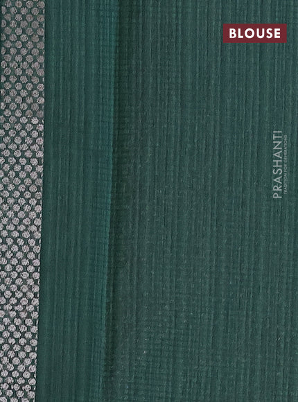 Matka tussar saree dark green with woven buttas and piping border