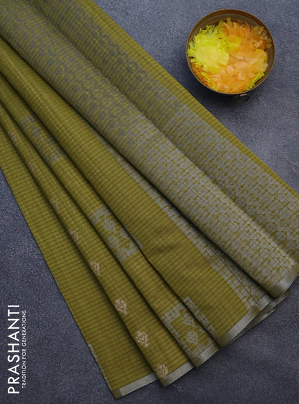 Matka tussar saree mehendi green with silver zari woven buttas and piping border