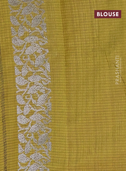 Matka tussar saree mehendi green with thread & silver zari woven buttas and piping border