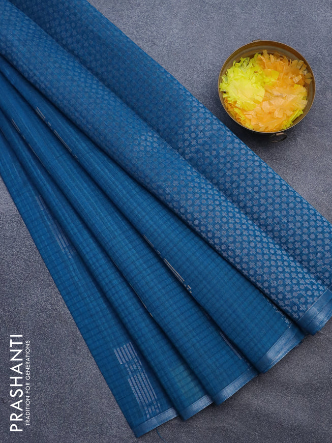 Matka tussar saree cs blue with silver & gold zari weaves and piping border