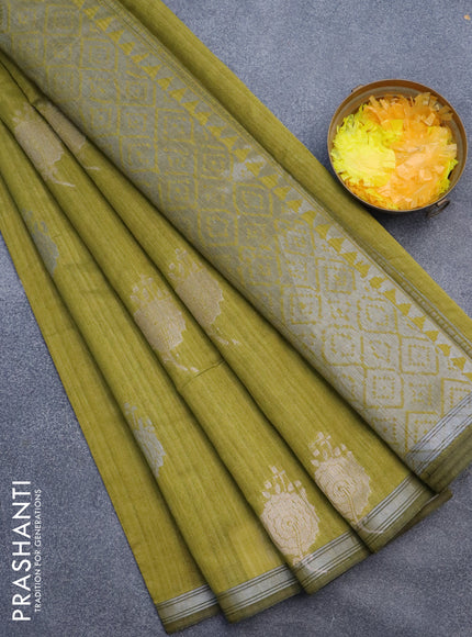 Matka tussar saree mehendi green with silver & gold zari woven buttas and piping border