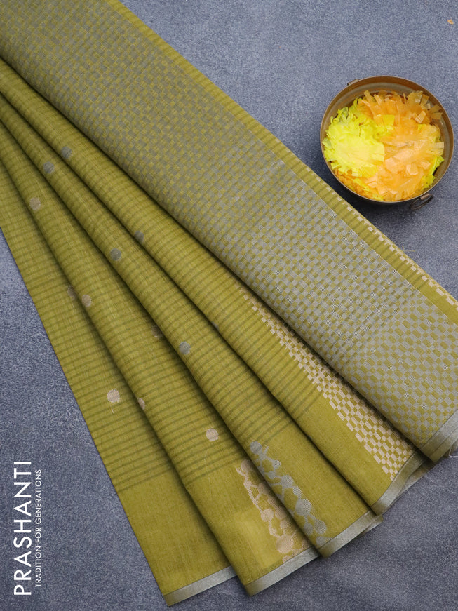 Matka tussar saree mehendi green with zari woven buttas and piping border