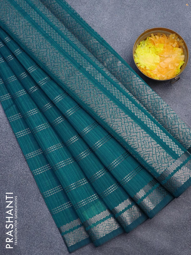 Matka tussar saree cs blue with allover zari weaves and zari woven border