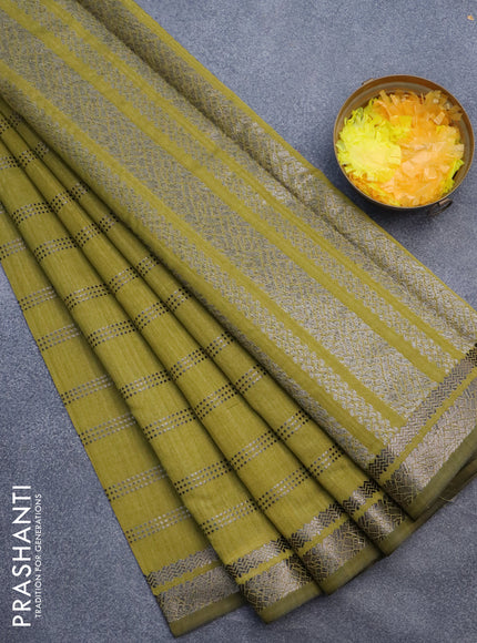 Matka tussar saree mehendi green with allover zari weaves and zari woven border