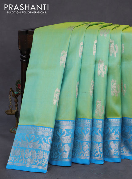 Venkatagiri silk saree dual shade of teal bluish green and light blue with silver zari woven buttas and rich silver zari woven border