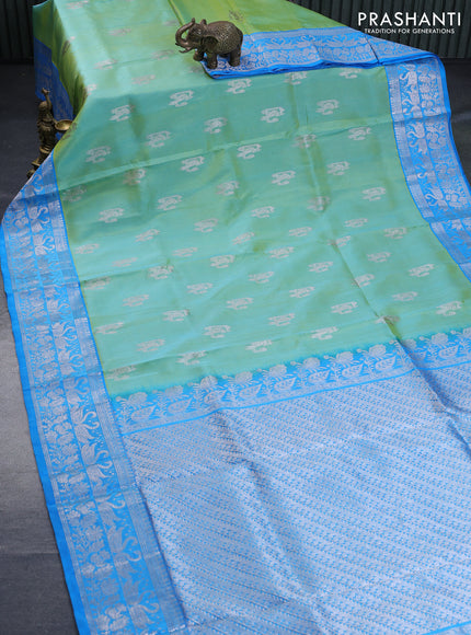 Venkatagiri silk saree dual shade of teal bluish green and light blue with silver zari woven buttas and rich silver zari woven border