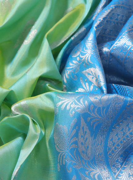 Venkatagiri silk saree dual shade of teal bluish green and light blue with silver zari woven buttas and rich silver zari woven border