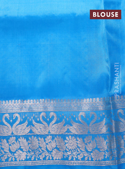 Venkatagiri silk saree dual shade of teal bluish green and light blue with silver zari woven buttas and rich silver zari woven border