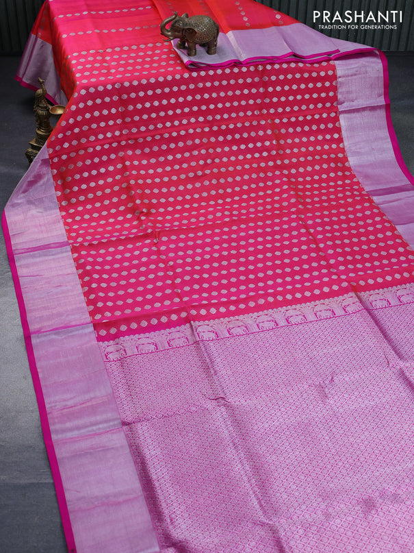 Venkatagiri silk saree dual shade of pinkish orange and pink with allover silver zari woven buttas and silver zari woven border