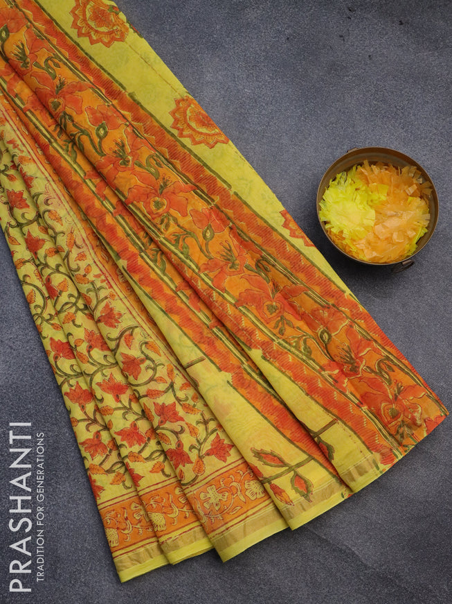 Chanderi bagru saree yellow and orange with allover floral prints and small zari woven border