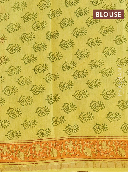 Chanderi bagru saree yellow and orange with allover floral prints and small zari woven border