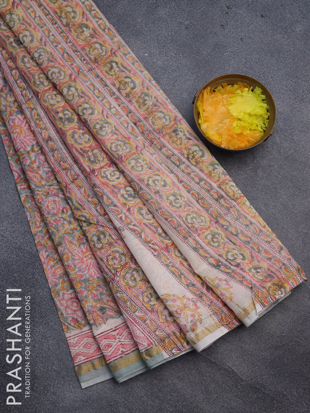 Chanderi bagru saree pastel green and off white with allover kalamkari prints and small zari woven border