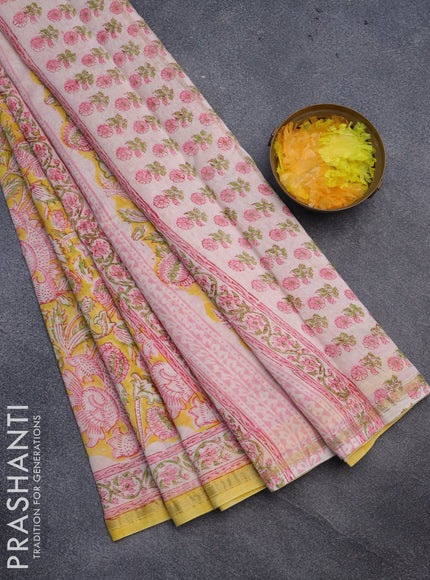 Chanderi bagru saree cream and yellow with floral butta prints and small zari woven border