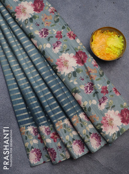 Semi tussar saree peacock blue and grey with allover zari woven veldhari design and floral printed border