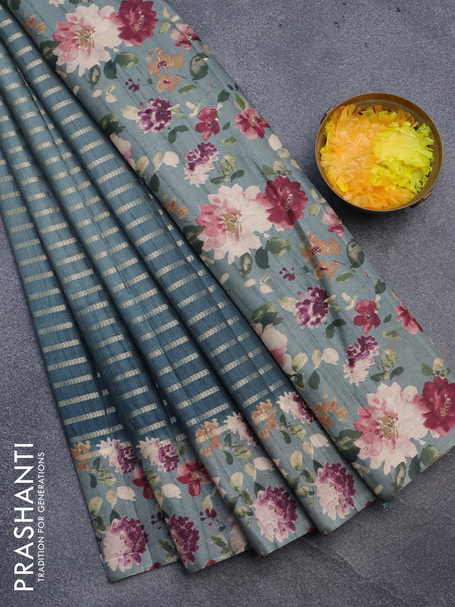 Semi tussar saree peacock blue and grey with allover zari woven veldhari design and floral printed border