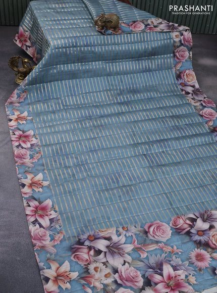 Semi tussar saree greyish blue with allover zari woven veldhari design and floral printed border