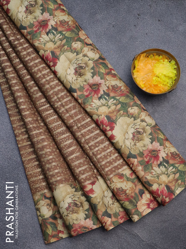 Semi tussar saree brown with allover zari woven veldhari design & bandhani prints and floral printed border