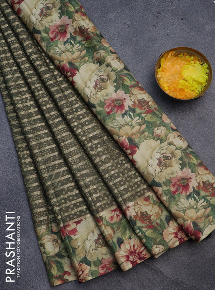 Semi tussar saree sap green with allover zari woven veldhari design & bandhani prints and floral printed border