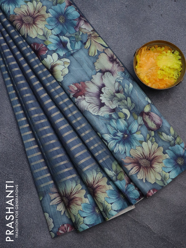 Semi tussar saree blue shade with allover zari woven veldhari design and floral printed border