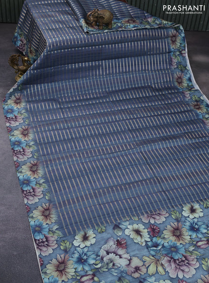 Semi tussar saree blue shade with allover zari woven veldhari design and floral printed border