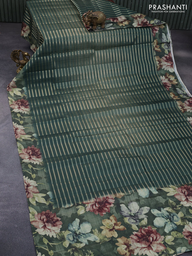 Semi tussar saree green with allover zari woven veldhari design and floral printed border