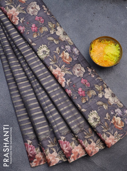 Semi tussar saree grey with allover zari woven veldhari design and floral printed border