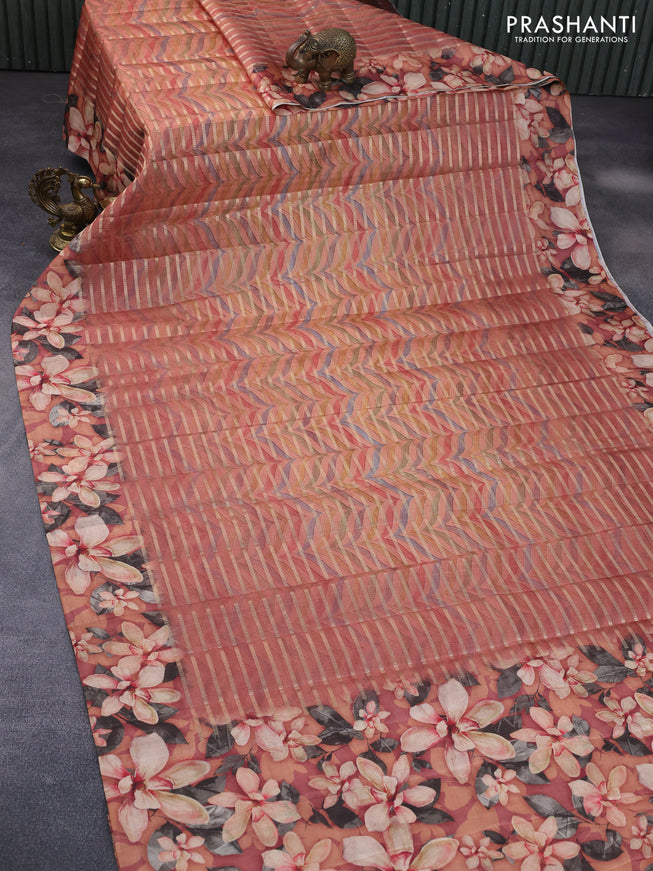 Semi tussar saree rustic orange with allover zari woven veldhari design & prints and floral printed border