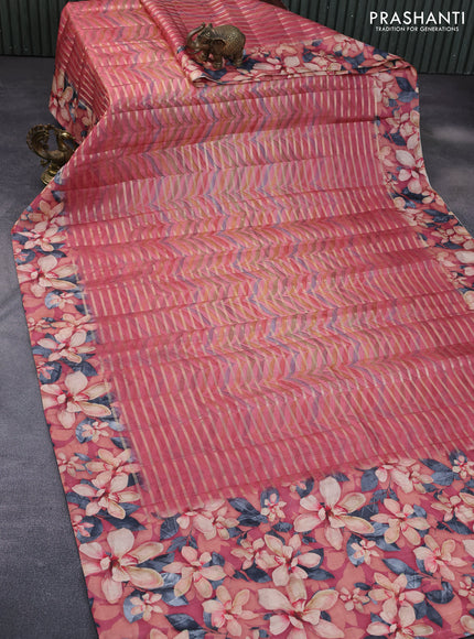 Semi tussar saree red shade with allover zari woven veldhari design & prints and floral printed border