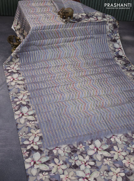 Semi tussar saree grey with allover zari woven veldhari design & prints and floral printed border