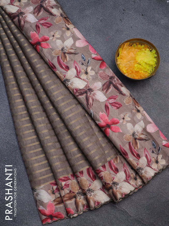 Semi tussar saree grey with allover zari woven veldhari design and floral printed border