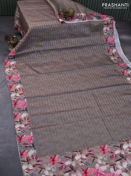 Semi tussar saree grey with allover zari woven veldhari design and floral printed border