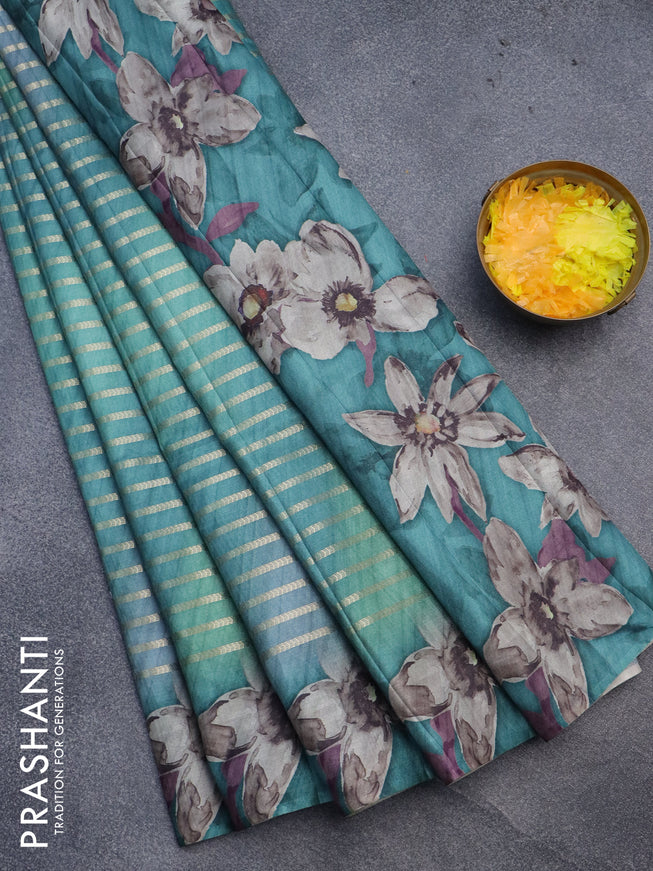 Semi tussar saree teal green with allover zari woven veldhari design and floral printed border