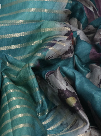 Semi tussar saree teal green with allover zari woven veldhari design and floral printed border