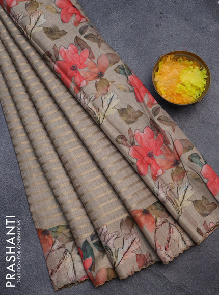 Semi tussar saree grey shade with allover zari woven veldhari design and floral printed border