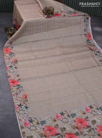 Semi tussar saree grey shade with allover zari woven veldhari design and floral printed border