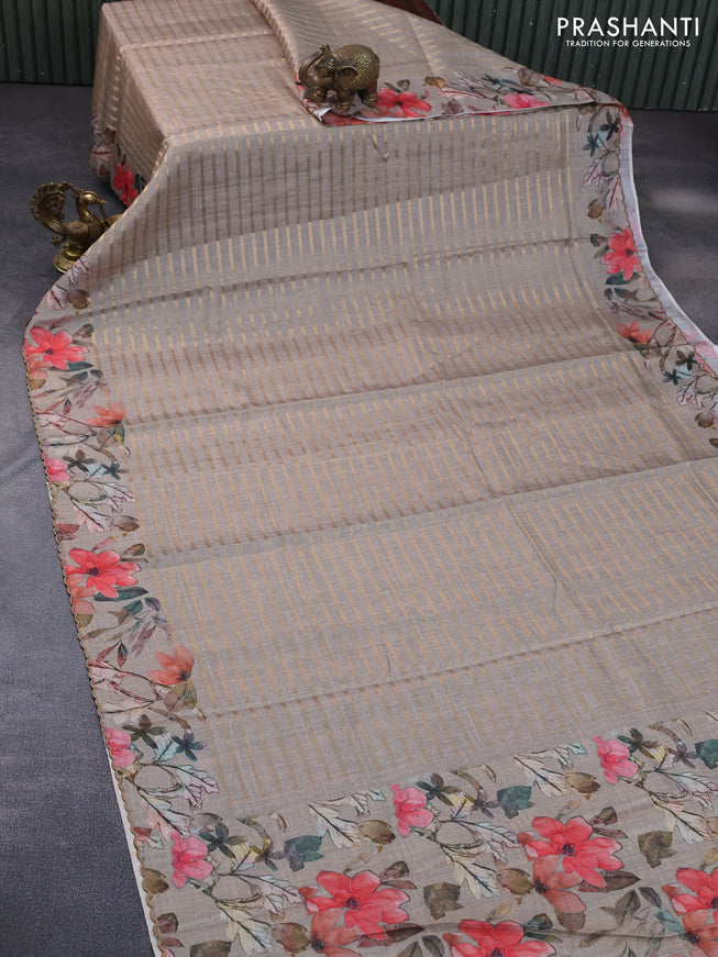 Semi tussar saree grey shade with allover zari woven veldhari design and floral printed border