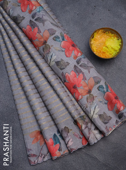 Semi tussar saree grey with allover zari woven veldhari design and floral printed border