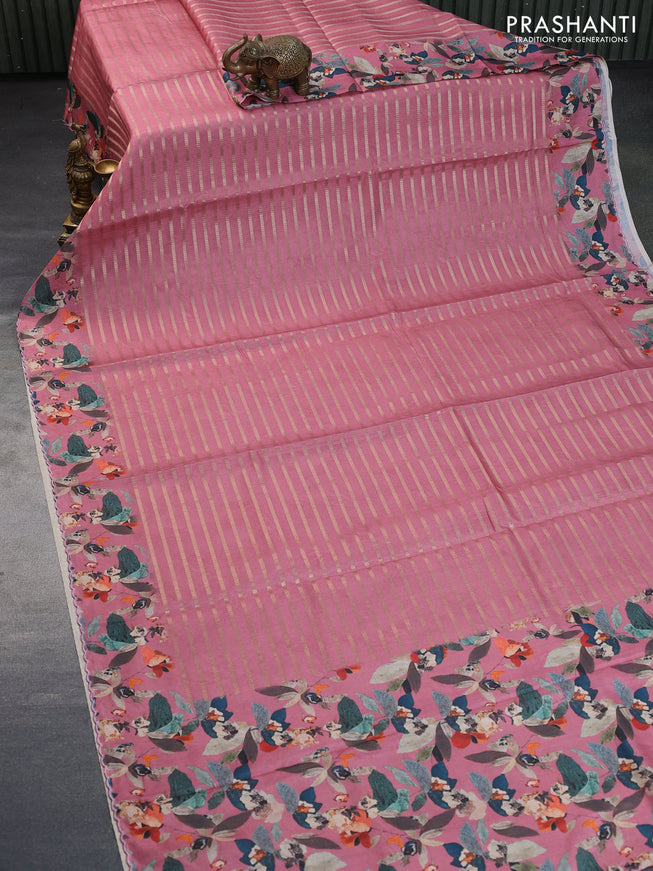 Semi tussar saree pink shade with allover zari woven veldhari design and floral printed border