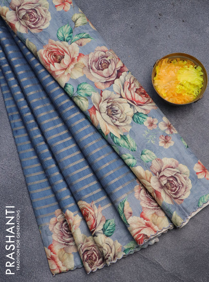 Semi tussar saree blue shade with allover zari woven veldhari design and floral printed border