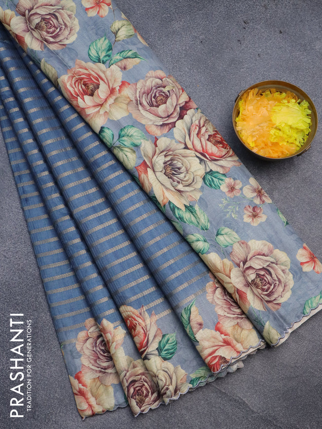 Semi tussar saree blue shade with allover zari woven veldhari design and floral printed border