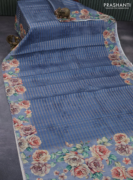 Semi tussar saree blue shade with allover zari woven veldhari design and floral printed border