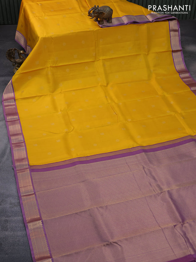 Pure kanchipuram silk saree yellow and mild purple with zari woven buttas and zari woven border