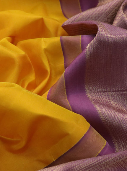 Pure kanchipuram silk saree yellow and mild purple with zari woven buttas and zari woven border