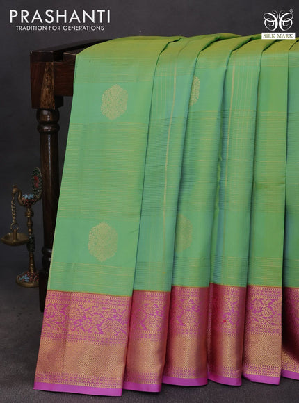 Pure kanchipuram silk saree green shade and purple with allover zari weaves & buttas and zari woven border